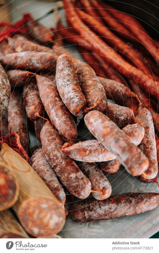 Meat sausages and nuts on food market chorizo meat agriculture artisan heap meal appetizing local yummy delicious tasty snack cuisine product natural stall