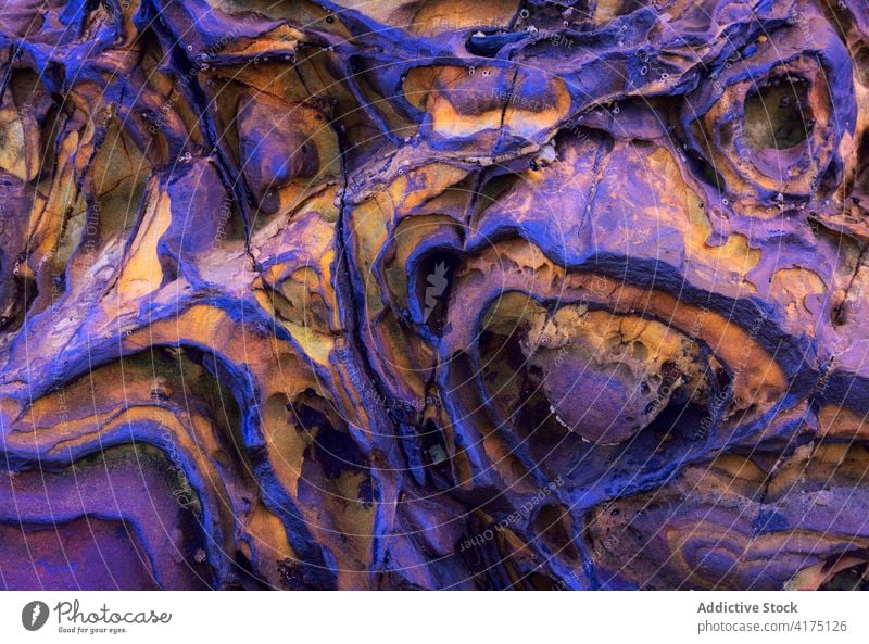 Texture patterns and colors on a cliff of a beach ground section sandstone layer texture mining mineral geology structure natural dirtied sedimentary geologic