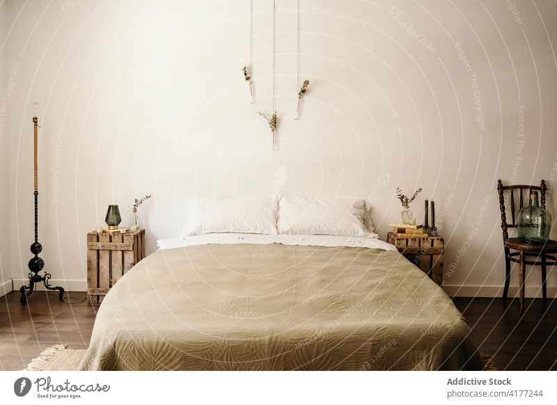 https://www.photocase.com/photos/4177244-nomadic-style-interior-of-bedroom-at-home-minimal-photocase-stock-photo-large.jpeg