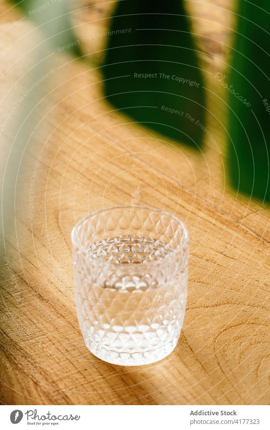 Glass of water on wooden table glass fresh drink beverage mineral natural full clear liquid thirst healthy hydrate refreshment clean pure aqua product wellness