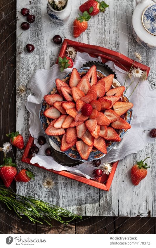 Strawberry tart on wooden table strawberry dessert sweet fresh garnish delicious treat tray gourmet pastry baked yummy serve assorted appetizing nutrition