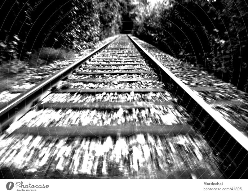 on the way Railroad tracks Speed In transit Transport Lanes & trails Black & white photo