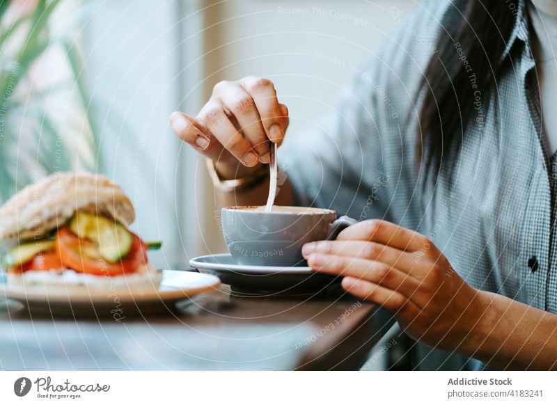 Woman drinking a cup of coffee woman coffee shop female cafe people person young restaurant lifestyle holding girl caucasian bar indoors social breakfast