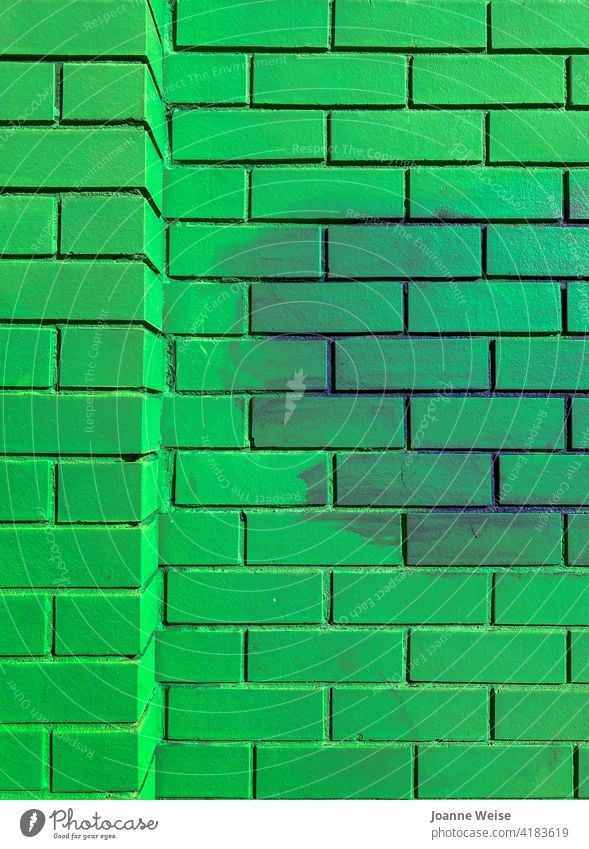 Green brick wall with purple cloud. Bright green Exterior shot Colour photo Day Brick wall Purple Bright Colours Wall (building) Architecture Facade