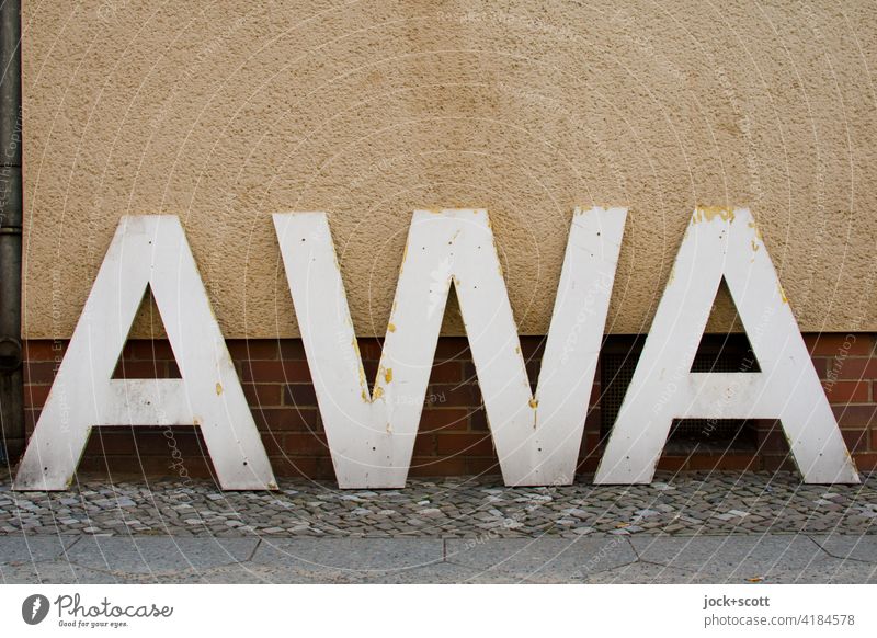 objective l simply AWA Capital letter Typography Signs and labeling house wall Sidewalk Neutral Background abbreviation set adhesive residues Rendered facade