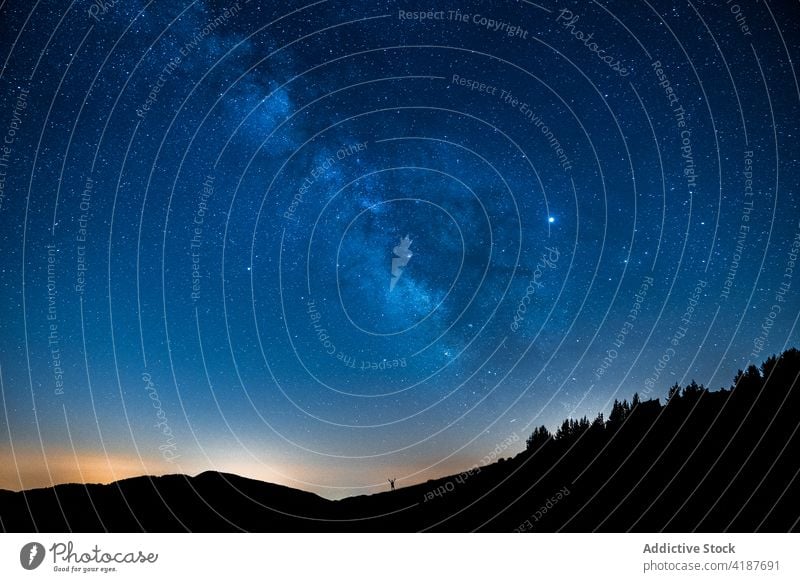 Bright starry sky above mountain at dusk blue sky galaxy nature astronomy cosmos space magic silhouette universe night cloudy landscape highland atmosphere