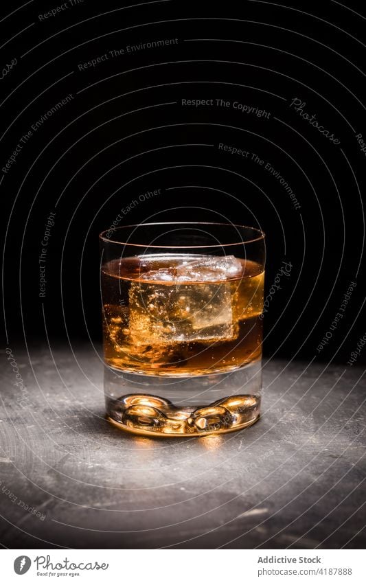 Classic Old fashioned cocktail in glass old fashioned alcohol drink whiskey ice classic beverage tradition cold refreshment serve party bar pub garnish