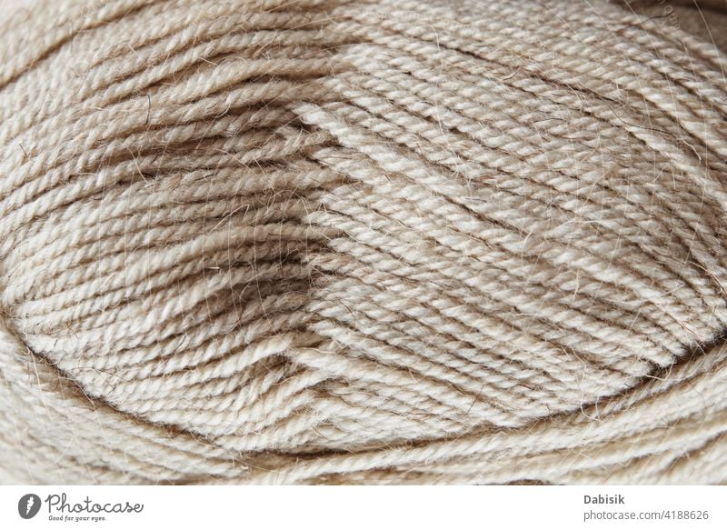 Skein of woolen yarn on wooden background knit knitting skein needlework handmade hobby thread craft material warm soft fashion textile homemade winter color