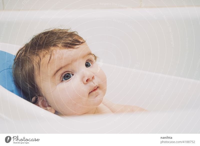 Baby time to bath in a normal day of a family baby clean bathroom care soap champoo hair water daycare routine hygiene sanitation skin babyhood child kid