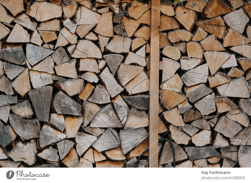 close-up of pile of timber biomass carpentry cut deforestation energy fire wood firewood forestry hardwood home improvement industry log lumber material natural