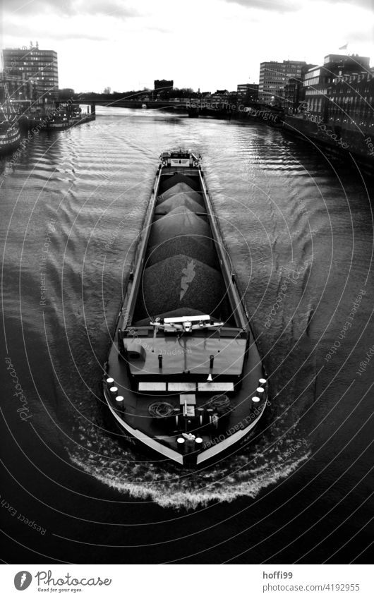 loaded barge on the river Weser near Bremen Inland navigation Cargo River calm water Navigable water Watercraft Logistics Trade Navigation bulk material Coal