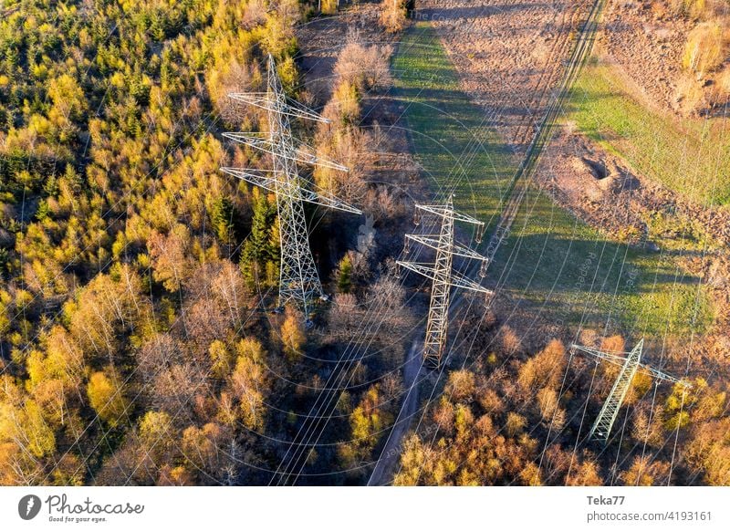 a high voltage road from above votlage ampere spring electricity pylon energy danger cable high voltage pylon power plant energy transportation