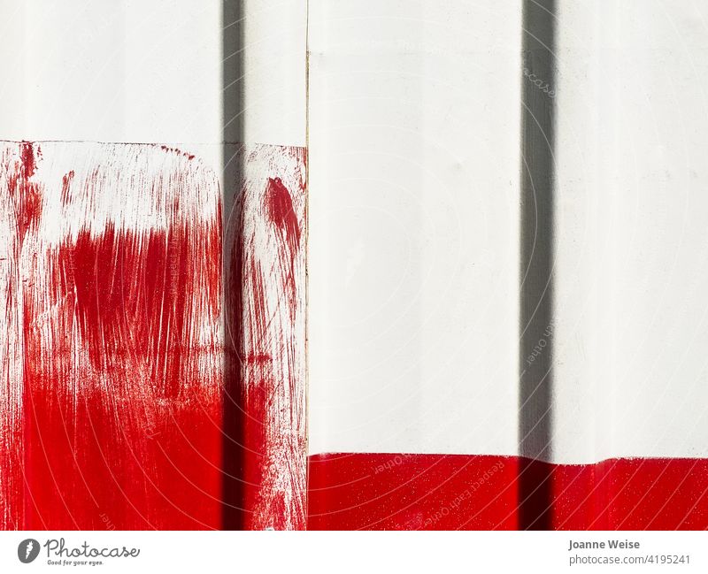 White wall with bright red paint brushstrokes. white wall red and white Red Wall (building) Exterior shot Colour photo Facade Building Day Detail Brush stroke