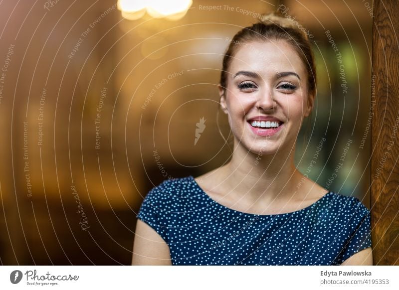 Smiling woman in the office looking at camera girl people Entrepreneur business businesswoman successful professional young adult female lifestyle indoors