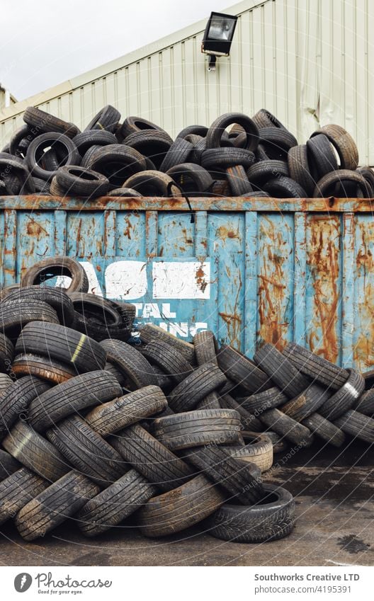Pile Of Tyres From Scrapped Cars In Vehicle Recycling Centre tyre tire car accident wreck crash loss adjuster insurance claim auto right off written off