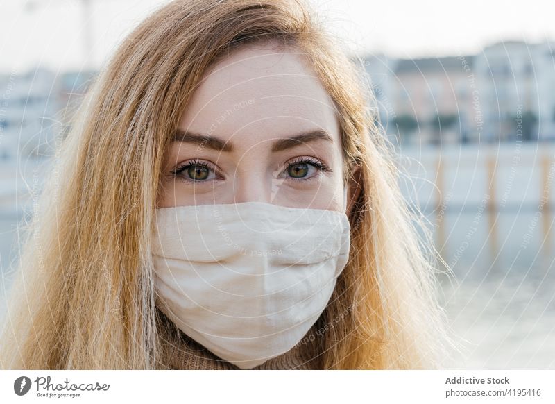 Woman in protective mask in city woman coronavirus new normal prevent covid 19 safety epidemic female outbreak calm infection contagious covid19 pandemic urban