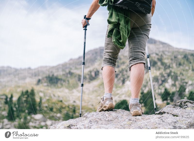 Unrecognizable woman with walking poles in picturesque highlands pole walking freedom excited trekking achieve vitality win mountaineer ruda valley catalonia