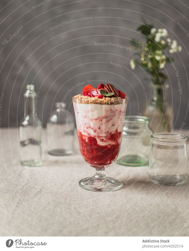 Delicious dessert with ripe berries and ice cream sweet berry compote milkshake delicious tasty yummy strawberry fresh dairy ingredient appetizing jar palatable