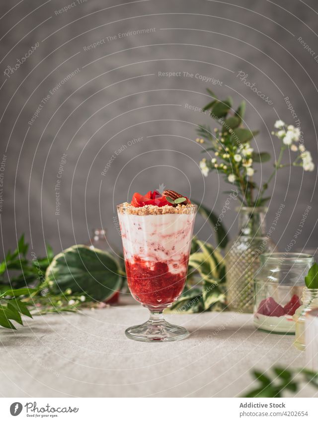 Delicious dessert with ripe berries and ice cream sweet berry compote milkshake delicious tasty yummy strawberry fresh dairy ingredient appetizing jar palatable