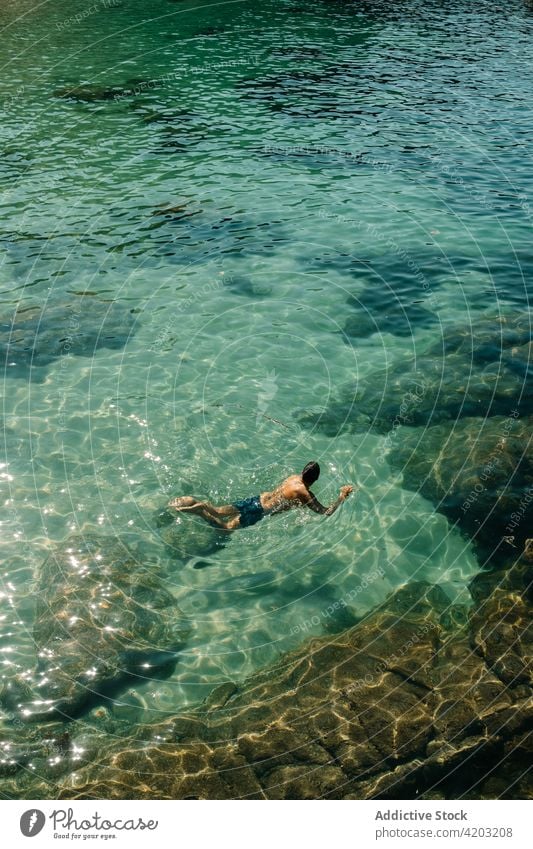Man Floating In The Sea sea man alone water person travel ocean summer leisure marine nature happy vacation lifestyle relax adventure calm people retired adult