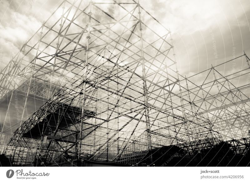 doubly well equipped Structures and shapes Scaffold Architecture Installations Construction Scaffolding Complex Double exposure Clouds in the sky