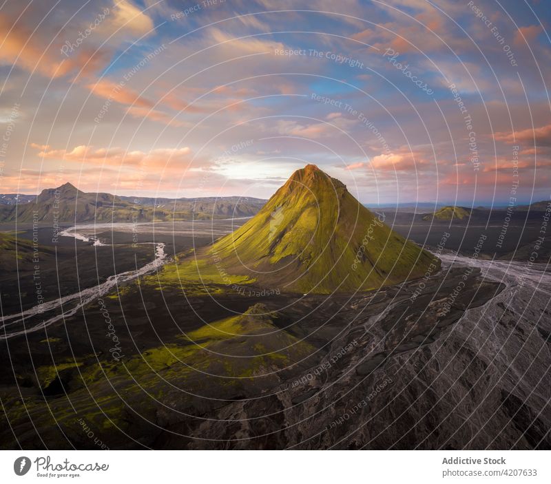 Amazing grassy peak in countryside hill sky view iceland nature landscape travel trip journey tourism mountain season valley rock stone weather majestic