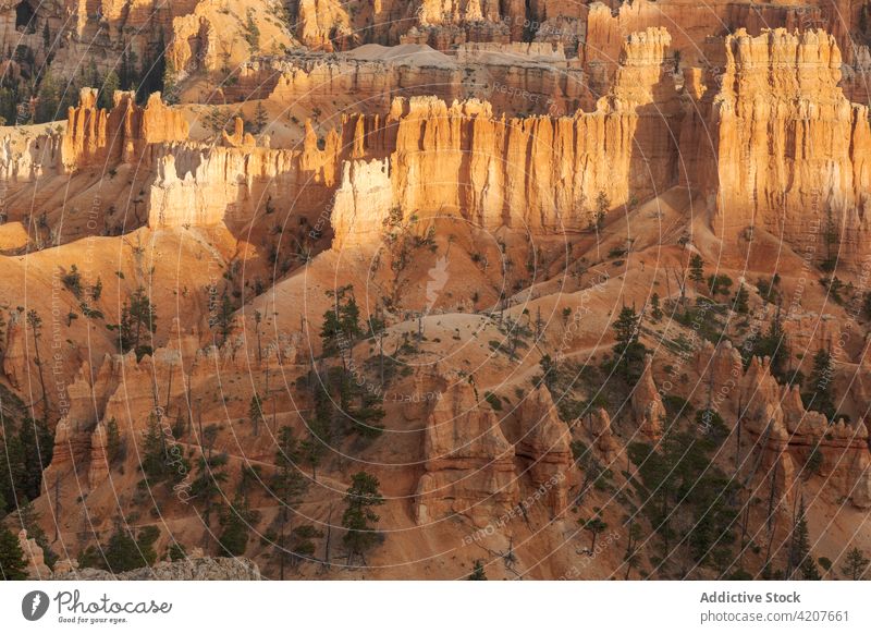 Thin sandstone peaks in mountainous terrain in USA rocky formation desert bryce canyon national park cliff nature landscape scenery cloudy usa united states