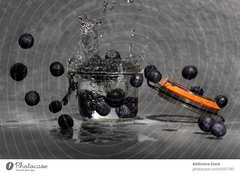 Blueberries falling in glass jar with water berry splash blueberry fresh moment waterdrop studio liquid delicious crystal nutrition natural aqua organic ripe