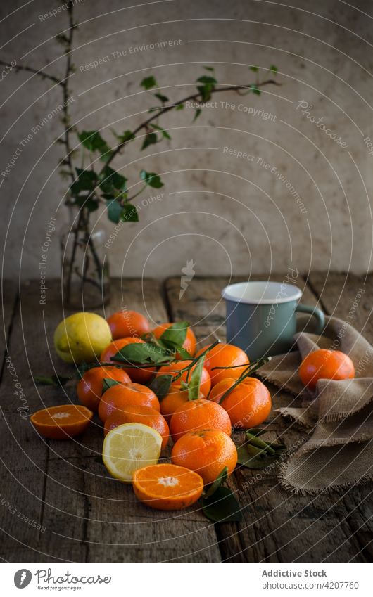 Fresh ingredients for tangerine mousse on shabby wooden table assorted fresh recipe dessert sweet fruit lemon citrus healthy tasty kitchen cup napkin mug home