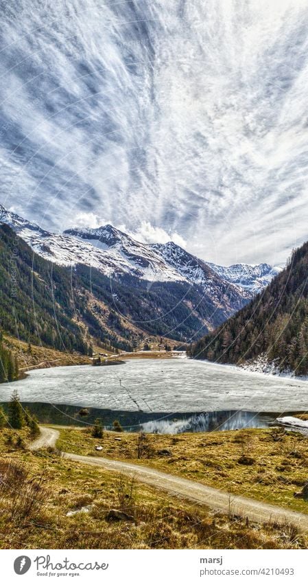 Spring awakening at the Riesachsee. Partially frozen mountain lake, nestled in the Alps. Mountain lake Nature Harmonious Life Joie de vivre (Vitality)
