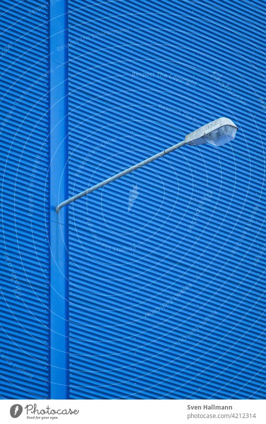 Lamp on blue wall Light Lighting Street lighting Colour photo Illuminate Blue Metal Sky Lamp post Day City Technology Copy Space background straightforwardness