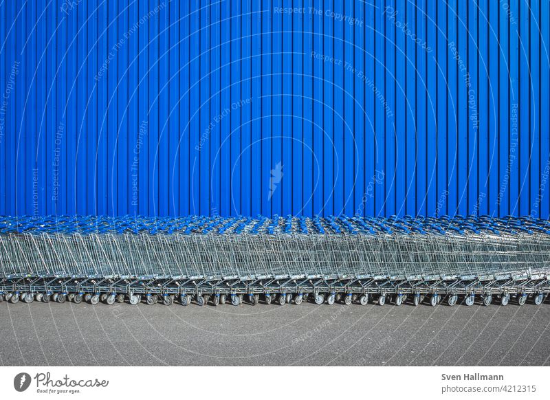 OLYMPUS DIGITAL CAMERA Modern Building Line Blue Waves Aluminium Architecture Facade Structures and shapes Abstract shopping venture Symmetry Design