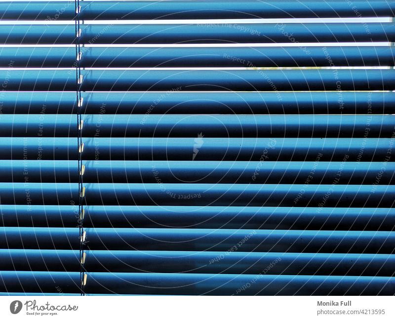 Blue closed blind with light and shadow Venetian blinds lines Closed Light Shadow Deserted