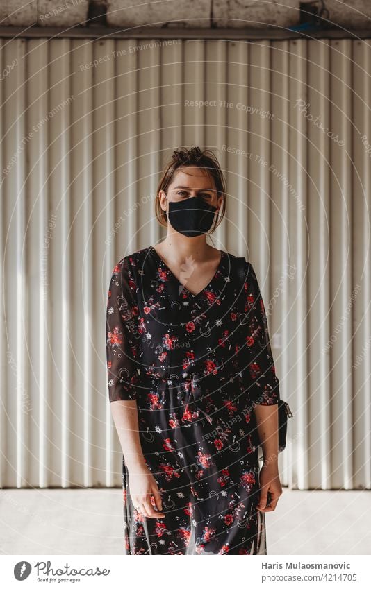 urban woman with face mask in a flower dress adult american anxiety apocalyptic black breathe caucasian color concept coronavirus covid 19 covid 19 depression