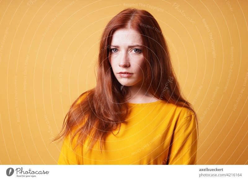 sad young woman looking worried and depressed unhappy concerned worry person nervous anxious depression people girl female portrait caucasian adult casual lady