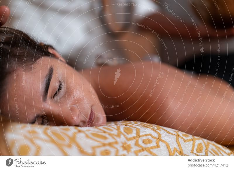 Relaxed topless woman against crop spiritual practitioner massage eyes closed harmony relax zen master calm sleep portrait alternative medicine ornament