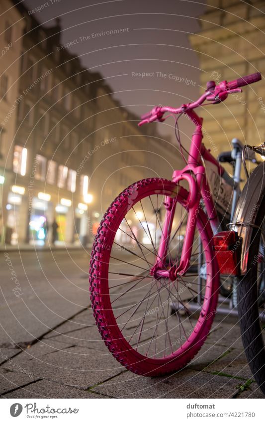 Pink bike in downtown fog Bicycle Wheel Spokes Tire Exterior shot Means of transport Deserted Transport Metal Parking Cycling Mobility Movement