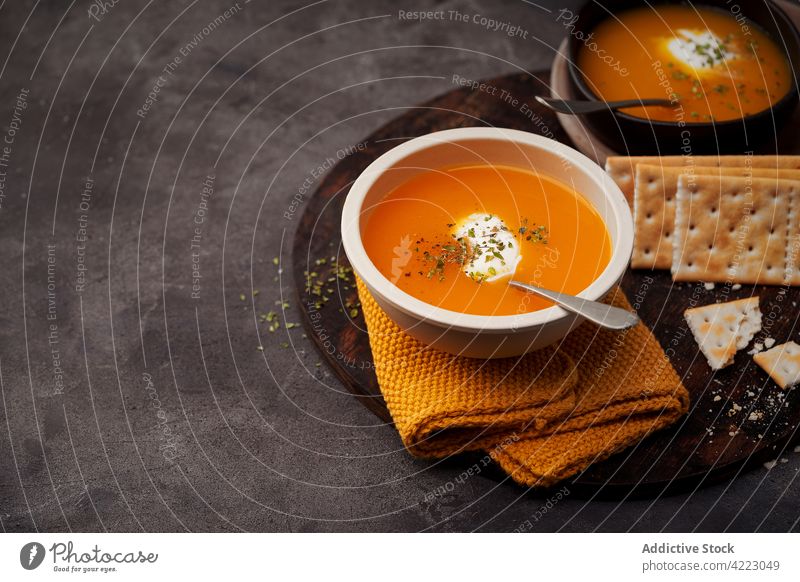 Delicious plates of creamy pumpkin soup seen from above Creamy Pumpkin Soup orange autumn healthy meal food dinner vegetarian vegetable delicious bowl soup