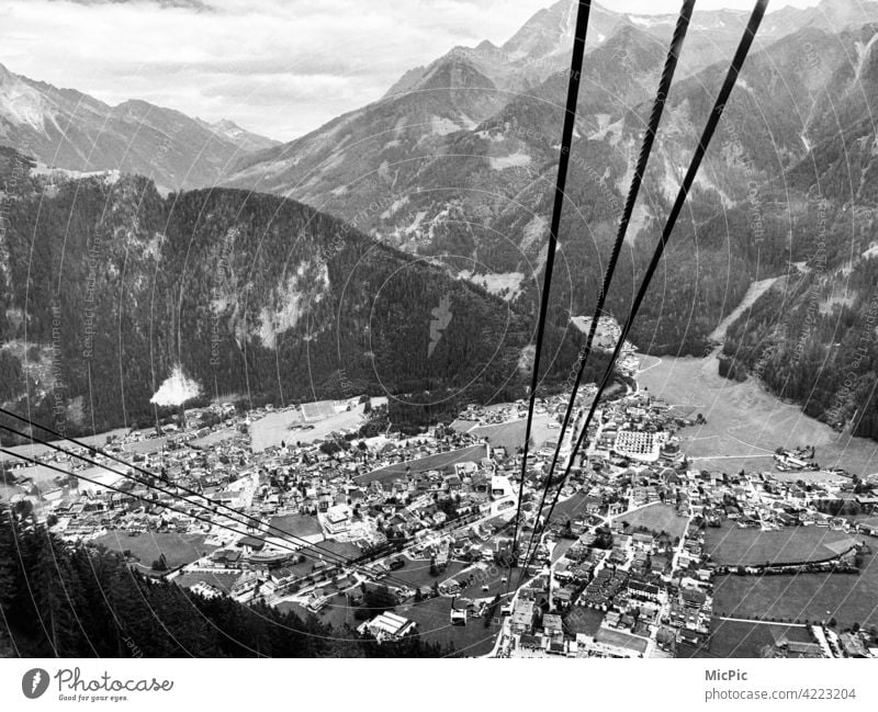 high up Cable car Vantage point View into the valley depth Fear of heights Rope Steel outlook Mountain Nature Valley Wire cable Panorama (View) Mayrhofen