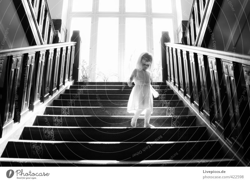at the castle Human being Feminine Child Toddler Body 1 1 - 3 years Stairs Window Clothing Dress Wood Going Esthetic Elegant Bright Warmth Soft Black White