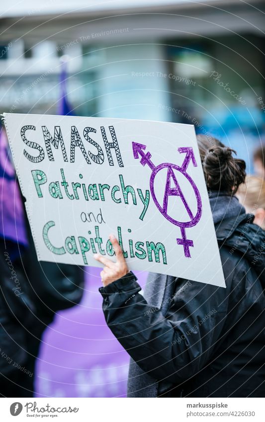 Feminist and anti-capitalist demonstration 1 percent Mobilisation Task Force action activist appeal capitalism change climate activist complain concept disaster