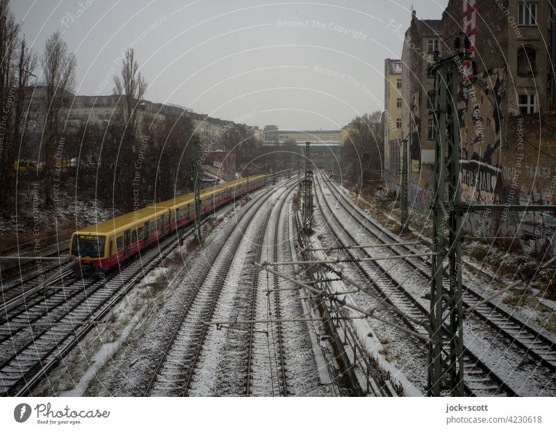 a winter day at the Ringbahn Bad weather Schönhauser Allee Prenzlauer Berg Berlin hazy Railroad system Winter Snow ring track Snowfall Traffic infrastructure