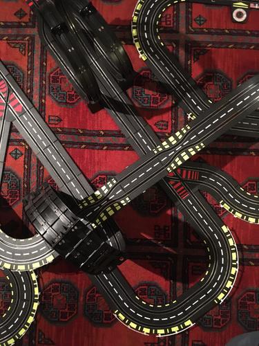 Curvaceous Model racecourse Toys cars Running swift speed Speed Street Miniature Transport Road traffic Motoring Colour photo Interior shot Carpet Pattern