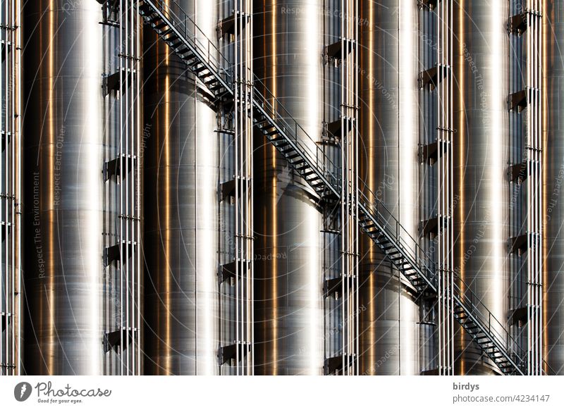 Stairs at an industrial plant, industrial silos made of stainless steel, format-filling Silos Industry Industrial plant Industrial building High-grade steel