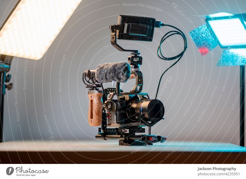 Camera with external monitor, mic, and handheld film-making rig. camera filmmaking film making full frame light 4k modern videography cinematography lamp