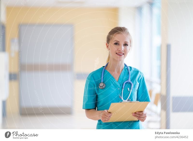 Portrait of a young female nurse in hospital healthcare medicine indoors equipment clinic recovery help medical patient ward therapy working job occupation