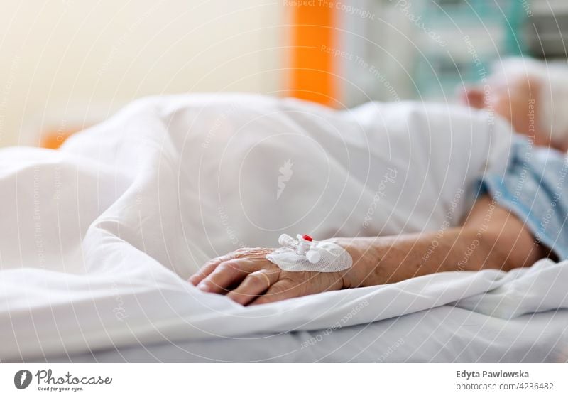 Cropped Image Of Patient With Iv Drip At Hospital hospital healthcare medicine indoors equipment clinic recovery help medical patient ward therapy working job
