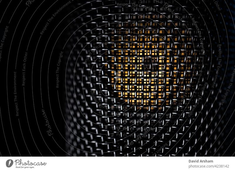Minimal Abstract Macro Closeup of Isolated Large Diaphragm Condenser Microphone grill and Capsule microphone large diaphragm condenser condenser microphone