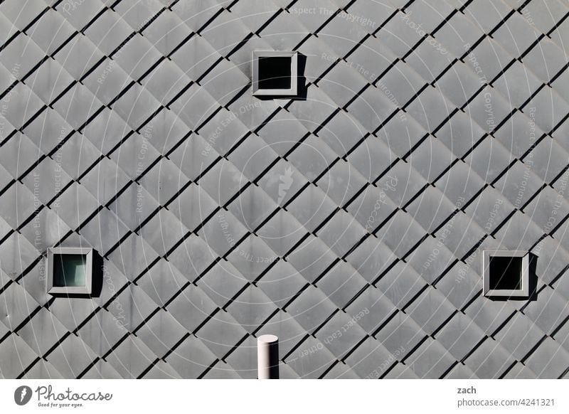 bright grey Pattern Loneliness Window Concrete Line Living or residing Facade Wall (building) Wall (barrier) Architecture Manmade structures Deserted