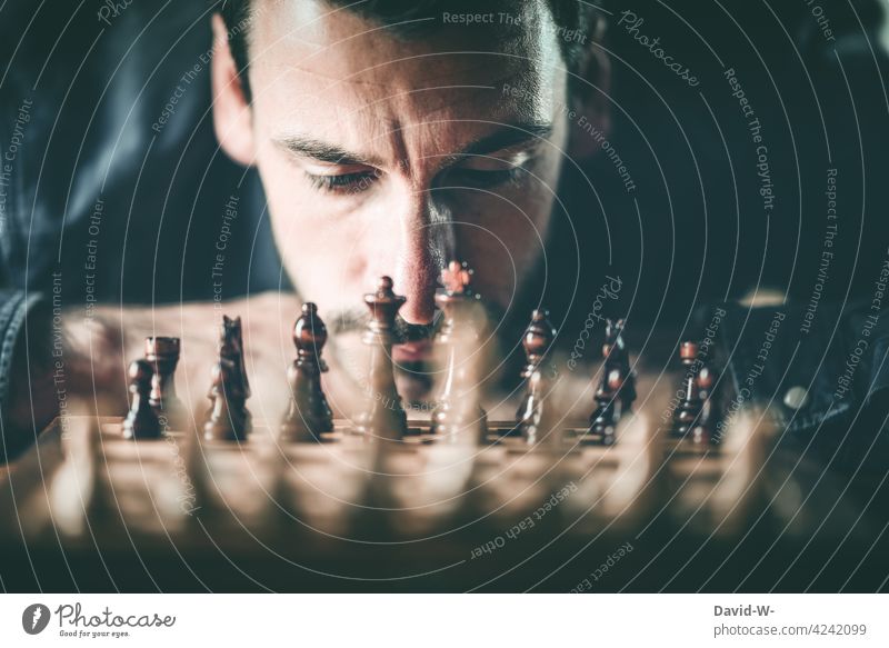 thoughtful man playing chess Chess Playing Meditative game Parlor games strategy concept think Duel